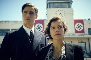 (L-R) MAX IRONS and TATIANA MASLANY star in WOMAN IN GOLD