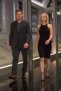 Jim (CHRIS PRATT) and Aurora (JENNIFER LAWRENCE) walk thru the Hibernation Bay on date night in Columbia Pictures' PASSENGERS